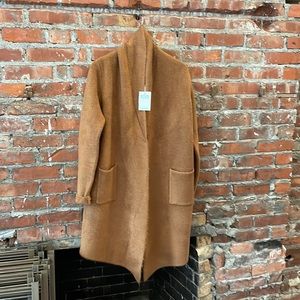 Brand new long sweater by Pink Martini.